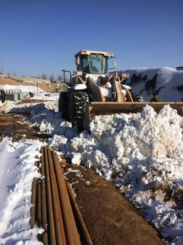 天工公司銅川項(xiàng)目部全體職工斗風(fēng)雪搶工期